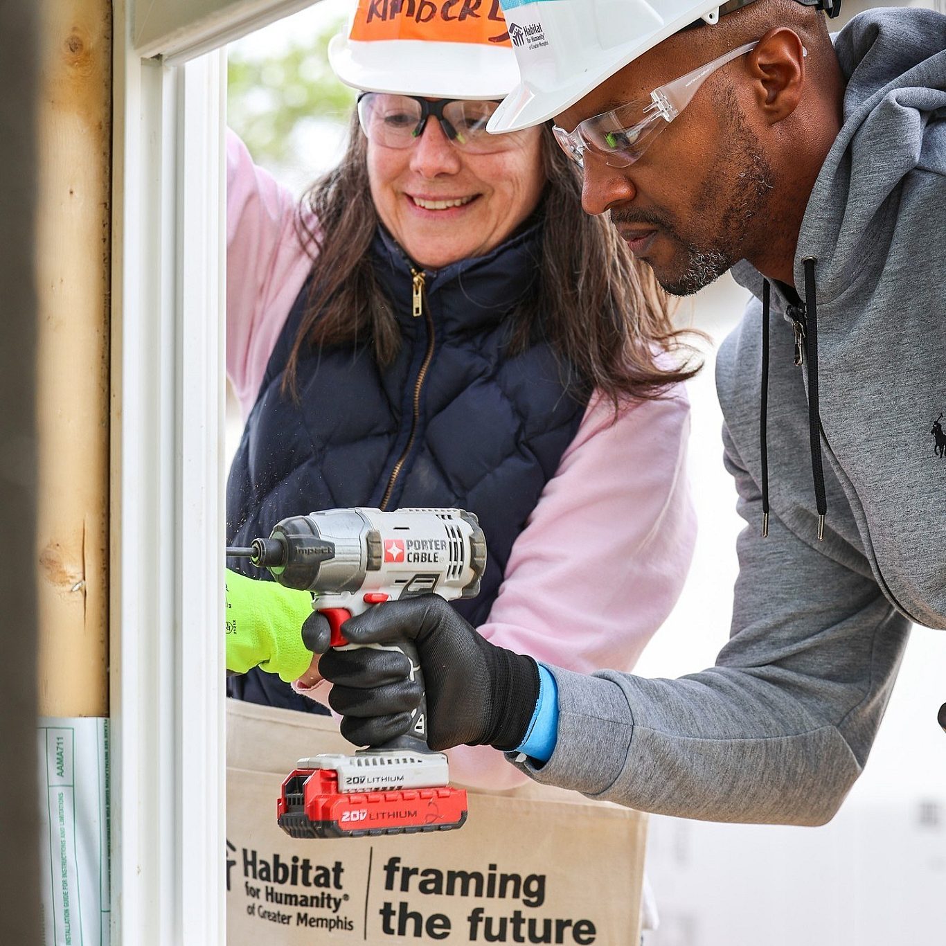 Coed volunteers build site 2