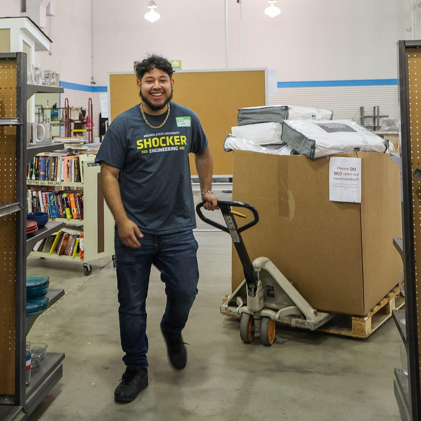 Re Store Smiling Volunteer