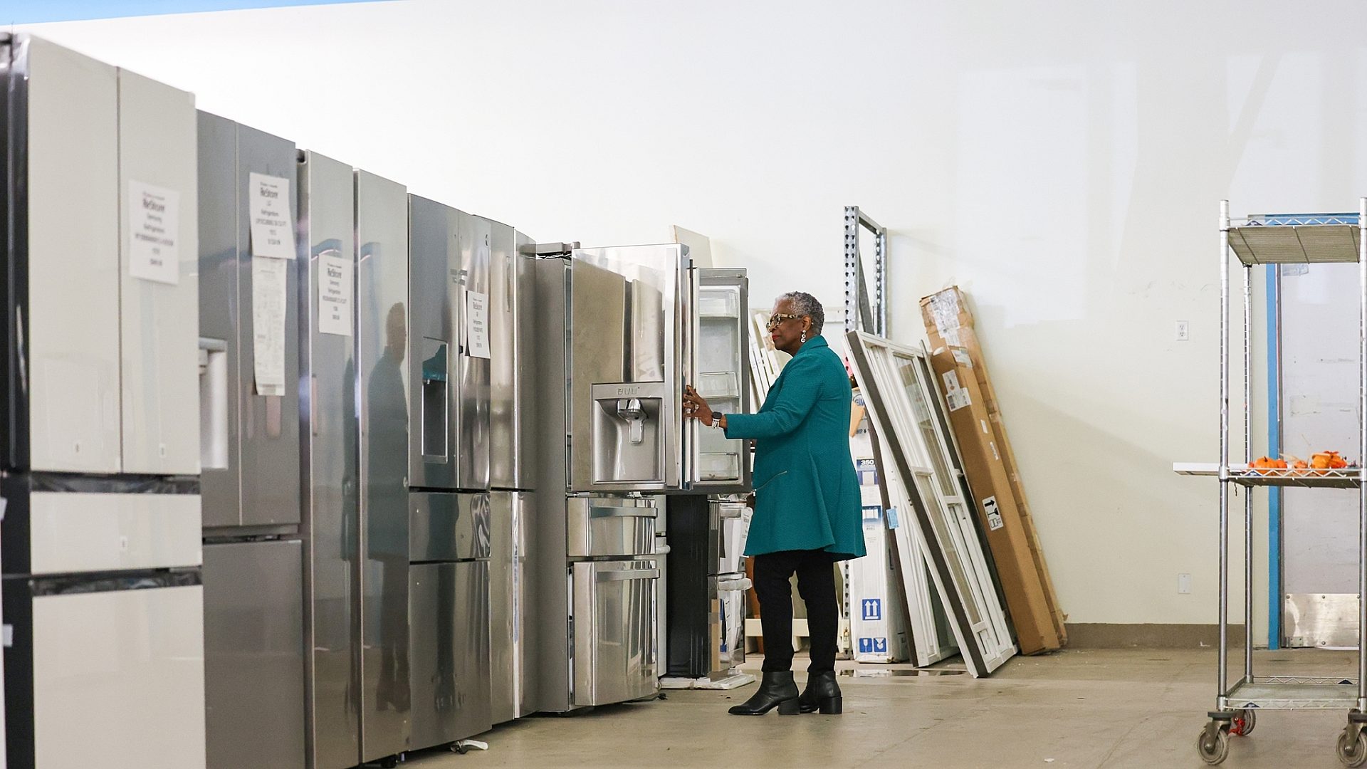 Re Store Woman shopping appliances